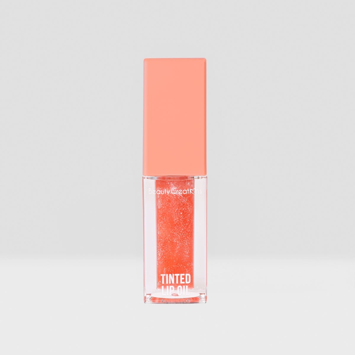 Tinta Luxe lip oil Beauty creations (tono sugar poppy)